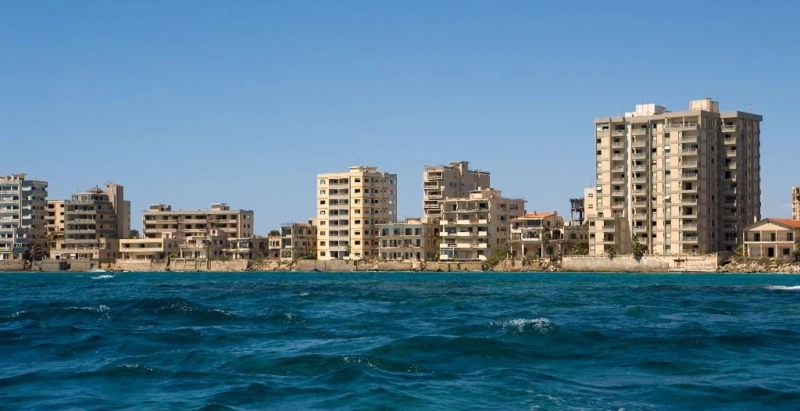 Skyline of abandoned high-rise buildings along the seafront of the ghost town of Varosha in Famagusta, Cyprus.