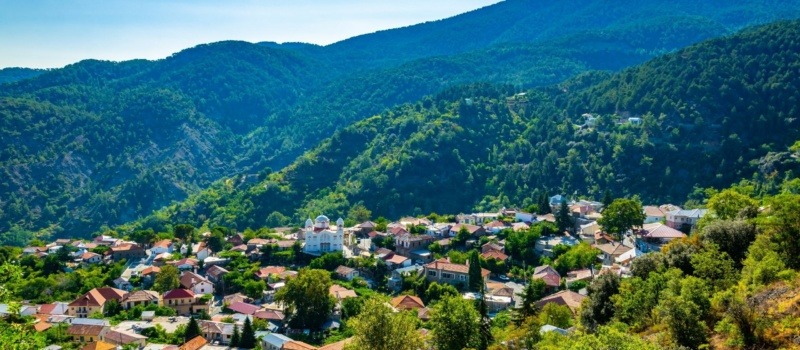 Lush green forested mountains and valley around Pedoulas village in the Troodos region of Cyprus.
